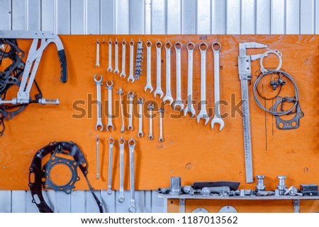 Set of tools as business cards on an orange background