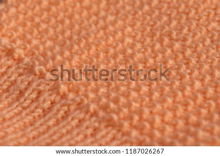 hand knitting at leisure samples of orange macro photo