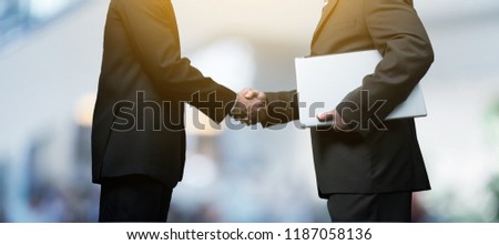 Handshake of business people