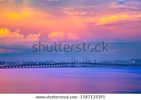 Beautiful Landscape of Penang bridge morning view sunrise aerial cityscape, one of the land transportation to travel from Malaysia main land to Penang Island Royalty-Free Stock Photo #1187133391