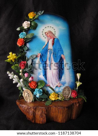 virgin Mary picture print on the stone