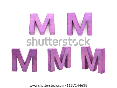 Single sawn wooden M letter symbol in different angles and foreshortenings isolated over the white background