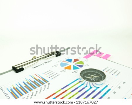 Marketing report chart and Financial graph analysis with compass.