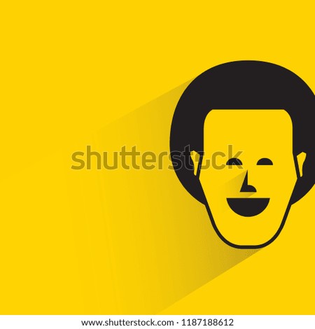 human face with shadow in yellow background