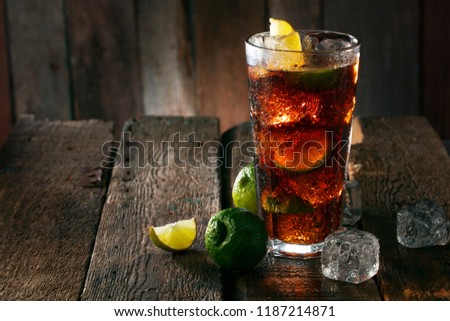 Cocktail with ice coke and lime Royalty-Free Stock Photo #1187214871