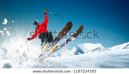 Skiing. Jumping skier. Extreme winter sports. Royalty-Free Stock Photo #1187224183