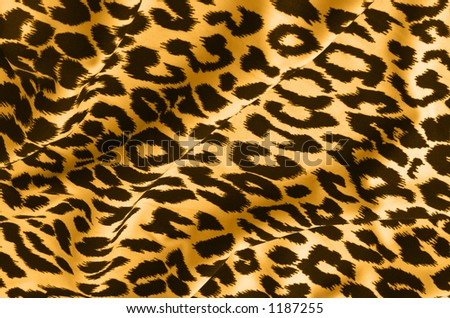 Animal print on fabric. Leopard, tiger.  Look at my gallery for more backgrounds and textures