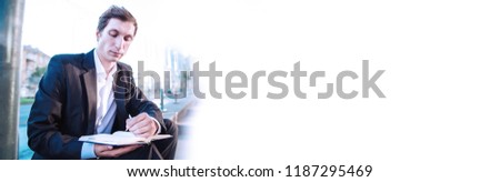 Businessman with business document or paper and pen in hand. Office corporate person work. Man, male professional paperwork with note, desk. Executive people write contract.