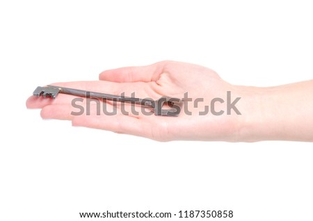 Key in hand on white background isolation