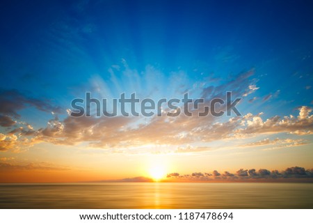 Beautiful sunset on the beach and sea - Vintage Filter Royalty-Free Stock Photo #1187478694