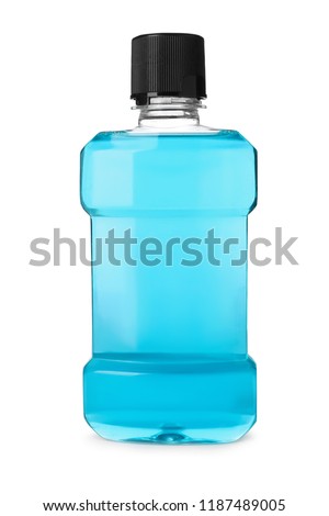 Bottle with mouthwash for teeth care on white background Royalty-Free Stock Photo #1187489005