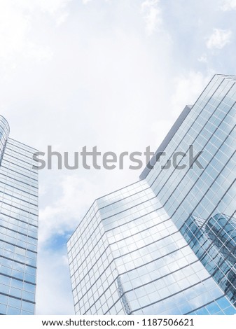 Panorama wide look up view of modern skyscrapers glass building with cloud reflection