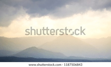 Landscape of mountain and forest during sunset.