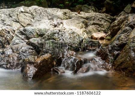 Water flowing, waterfall in Phuket Thailand. Slow Shutter