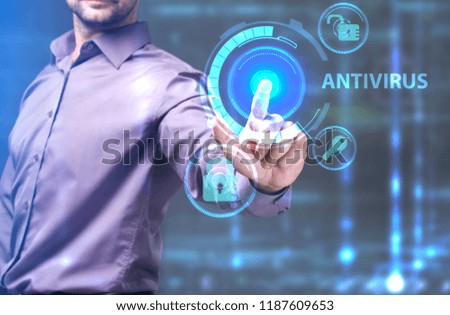 The concept of business, technology, the Internet and the network. A young entrepreneur working on a virtual screen of the future and sees the inscription: Antivirus