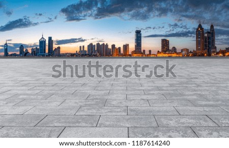 City skyscrapers and square slate ground