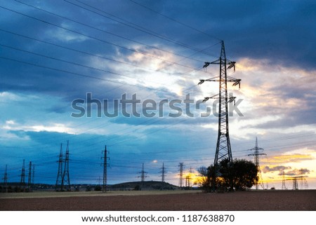 Electricity - Power energy Industry - Electric poles at the sunset with coloful sky