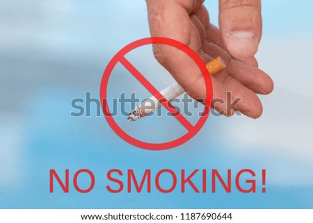 Hand with a cigarette crossed out. Smoking ban sign.