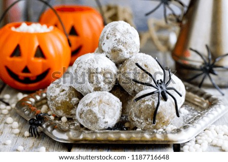 Halloween cookies - spider egg cookie balls covered in powdered sugar