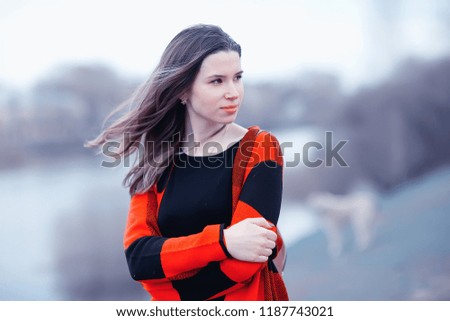 girl in coat outdoor / autumn photo model girl adult posing in park, girl in coat with long hair