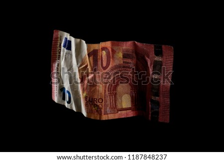 Ten Euro bill, banknote isolated on black background