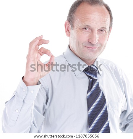 confident businessman shows gesture OK.isolated on white