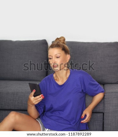 Woman relaxing using smarthone