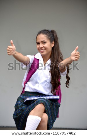 Catholic Colombian Female Student With Thumbs Up Wearing Uniform