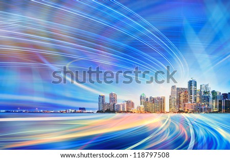 Abstract Illustration of an urban highway going to the modern city downtown at sunset or sunrise with colorful light trails.