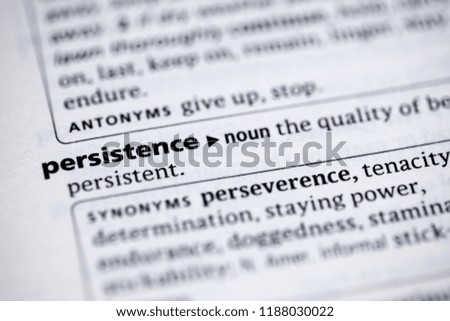 Close up to the dictionary definition of Persistence