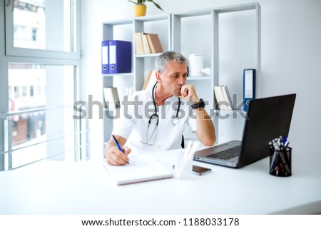 Doctor in his office