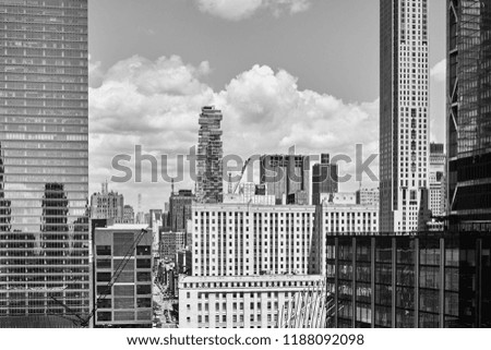 Black and white picture of old and modern New York City architecture, USA.