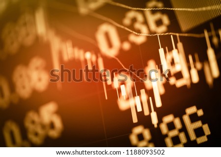 Candlestick chart in financial stock market on digital number background. Forex trading graphic design and Stock market trading trend as concept.