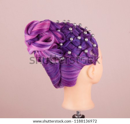 Mannequin's head with hairstyle chignon
