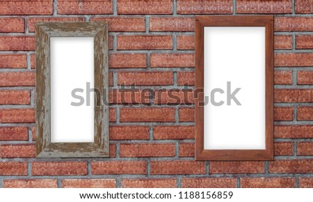 Brown natural wooden frame on bricks wall. blank picture frame on brick wall.