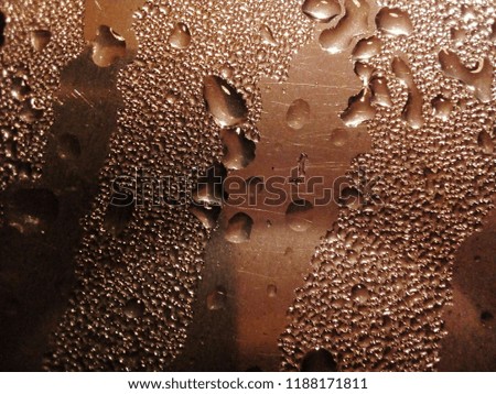 Drops of water on a metal surface.Creative background