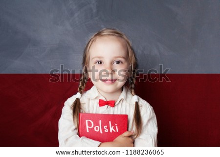 Polish concept with little girl student with book against the Polish flag background. Learn language Royalty-Free Stock Photo #1188236065