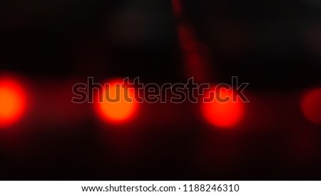 Night dark background bokeh, neon light, blurred background, light effect night view. Dark abstract background, laser glare.
