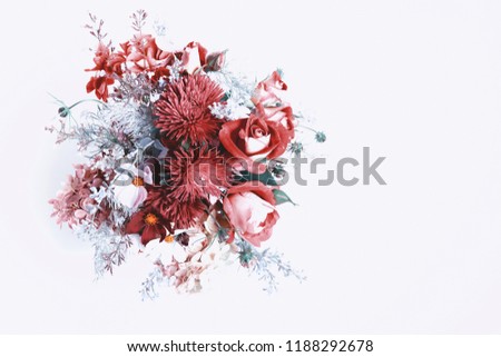 Bouquet of flowers in red, shades of Red Pear, Colors autumn winter 2018. Roses, berries, chrysanthemum, asters, kosmeja, hydrangea, wormwood. Flower composition on white background. Flat lay top view