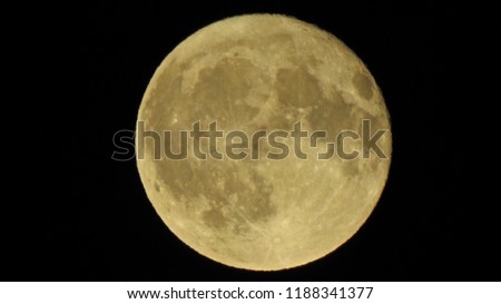 Extreme zoom photo of yellow full moon