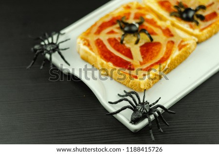 Funny sandwiches with  spider and  spider web for Halloween party, scary food