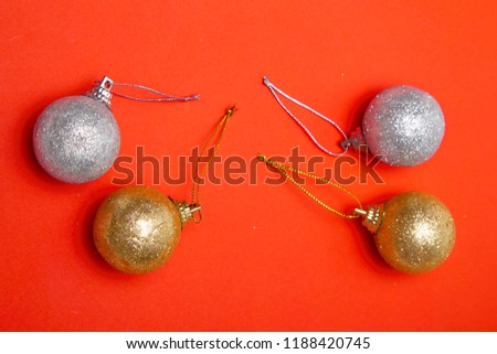 High angle view Christmas balls on red papar background, with space for your text