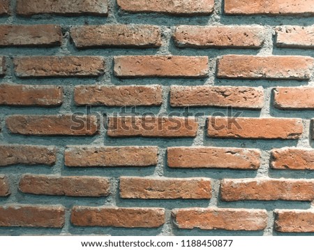 Old red brick wall texture background.
