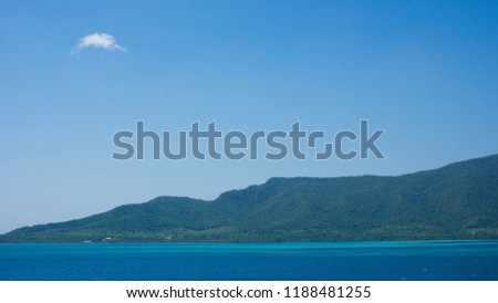 a huge island karimun jawa in central java indonesia with tropical weather and green forest mountain as background Royalty-Free Stock Photo #1188481255