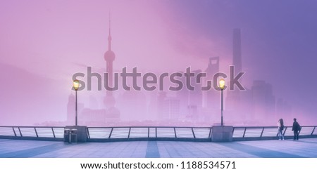 Scenery view of Shanghai skyline and Huangpu river with mist, China. Clipping path of sky