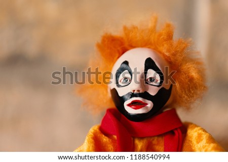 Cartoon clown with red hair   