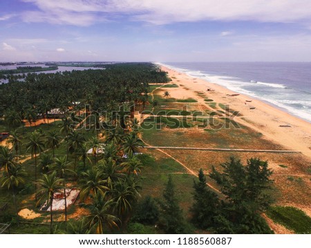 Aerial photos of the long beach at the sand bar island in Nigeria,West Africa. The island is a natural made island and a barrier of big waves reaching Lagos. Picture taken using a drone.