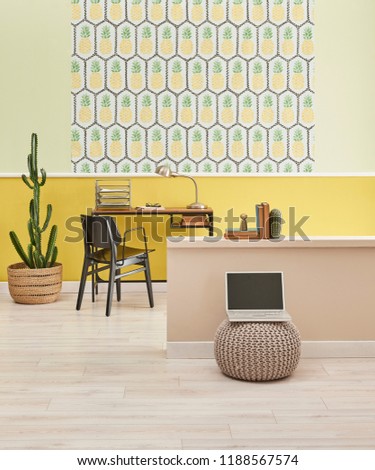 Pineapple wallpaper turquoise and yellow decorative wall and background. working table and living room style.