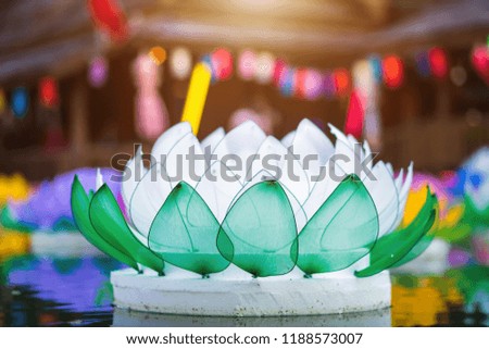 Beautiful kratong Made of foam is floating on the water for Loy Kratong Festival or Thai New Year  and river goddess worship ceremony,the full moon of the 12th month Be famous festival of Thailand.