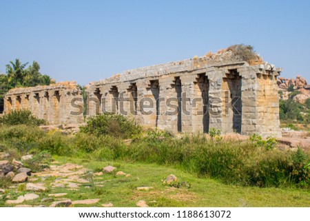 Ancient ruins of aqueduct in Vijayanagar city in Hampi, Karnataka. Best destination in IncredibIe India.